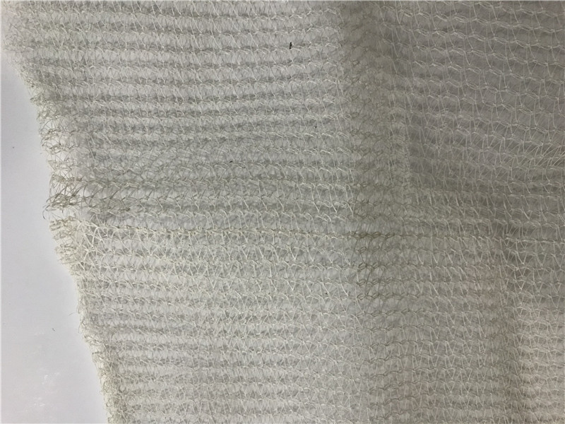 5 lat gwarantują beżową siatkę bezpieczeństwa rusztowań